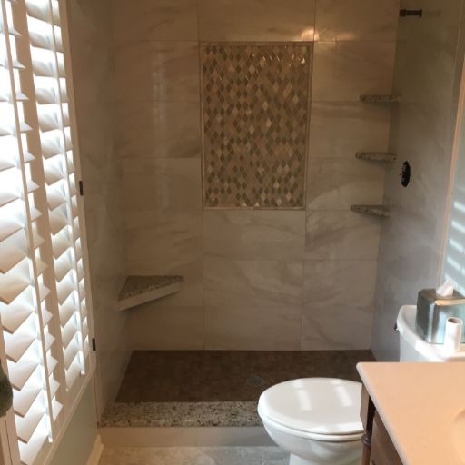 Custom Tiled shower with wall accent